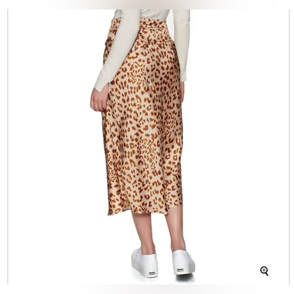13. Free People Normani Bias
Leopard Print Satin Midi
Skirt
Size: 2 - Picture 3 of 6